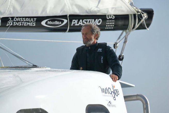 Michel Desjoyeaux at the helm of the Z2015 de Mer Agite catamaran