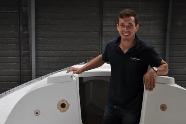 Thibaud Ramond, founder of Dream Racer Boats, poses on his Figaro1