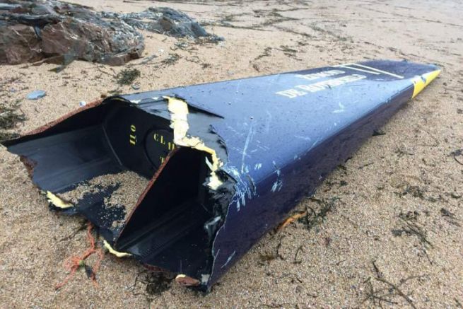 The torn bow of Gitana 17 found on a beach