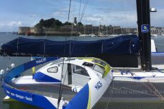 The trimaran Macif during the laying of the first stone of the Mer Concept building in Concarneau